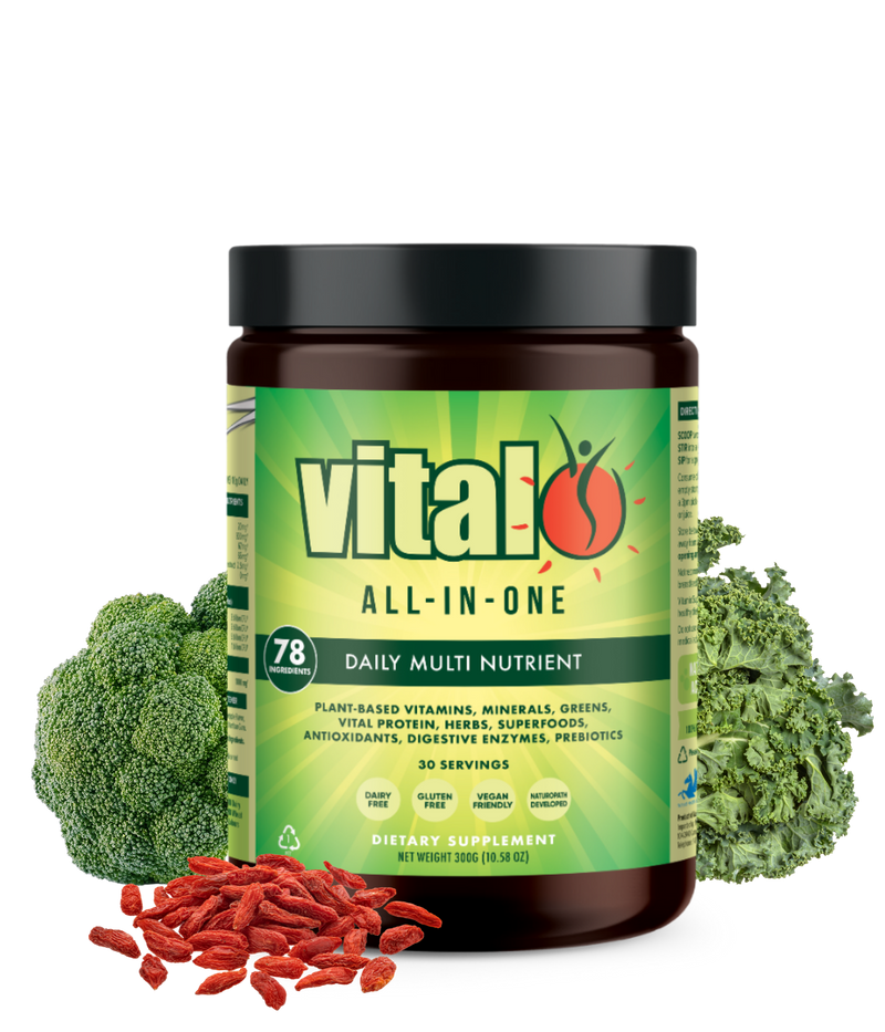 Supplement jar labeled 'vital all-in-one' with green label, surrounded by broccoli, goji berries, and kale on a white background.
